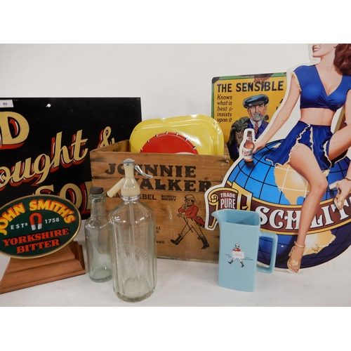 80 - A mixed lot to include Schlitz beer advertising, Pepsi cola sign, John Smith's pump stand, Johnnie W... 