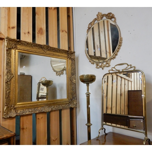 81 - A 19th century brass oil standard lamp base, brass framed fire screen and two gilt framed mirrors (4... 