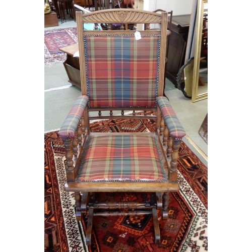 91 - A 20th century mahogany American style rocking chair