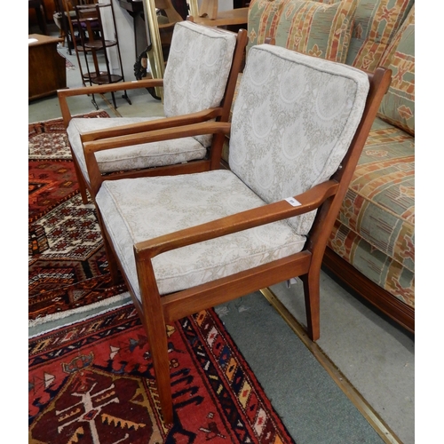 95 - A pair mid 20th century teak framed armchairs (2)