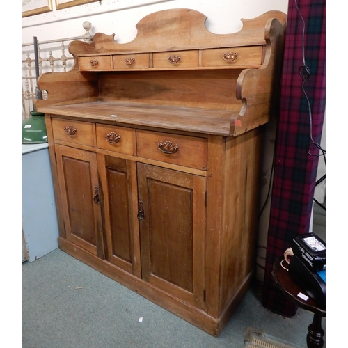 98 - An 20th century pine kitchen dresser with four drawer superstructure over three short drawers over t... 