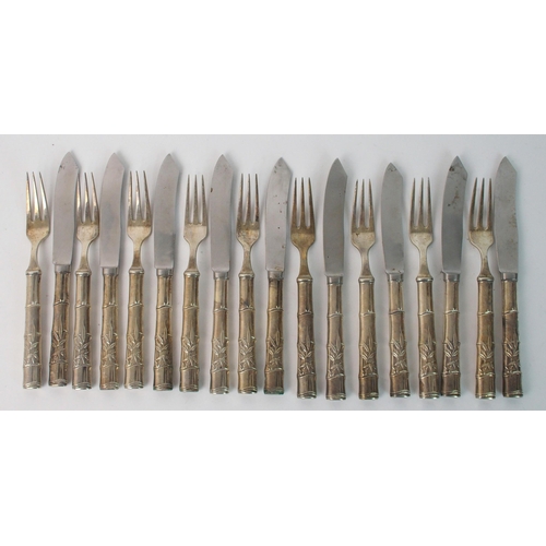 12 - A set of nine Asahi Sterling silver handled fish knives and forks