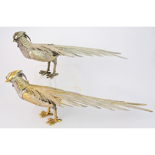 154 - A pair of Continental white metal Oriental Pheasant figures