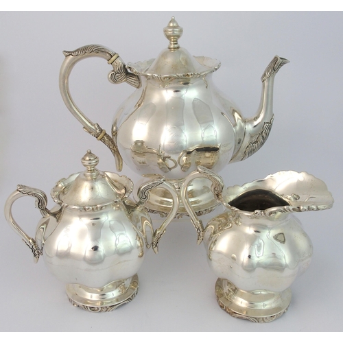 157 - A Mexican silver three piece tea service