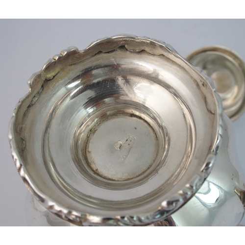 157 - A Mexican silver three piece tea service