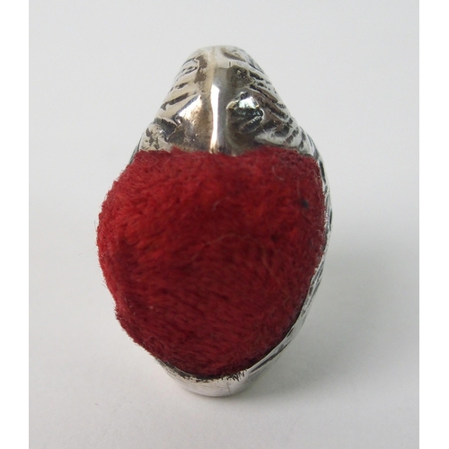 164 - A pair of novelty white metal pin cushions