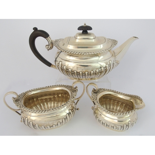 184 - A three piece silver tea service