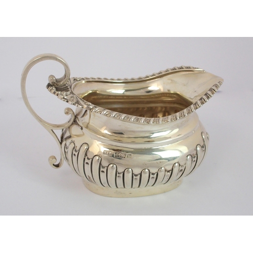 184 - A three piece silver tea service