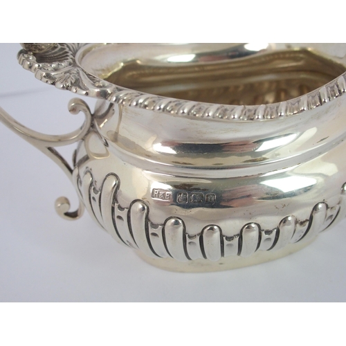 184 - A three piece silver tea service