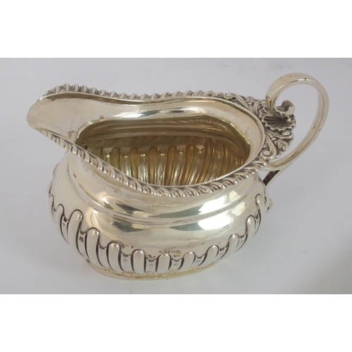 184 - A three piece silver tea service