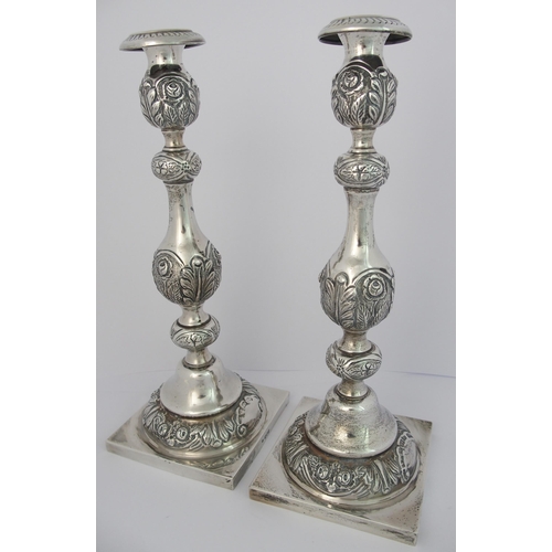 186 - A pair of silver candlesticks