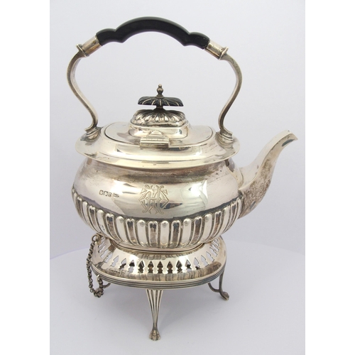 187 - A matched five piece silver tea service including spirit kettle on stand