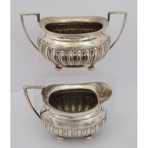 187 - A matched five piece silver tea service including spirit kettle on stand