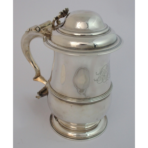 191 - A George III silver lidded tankard