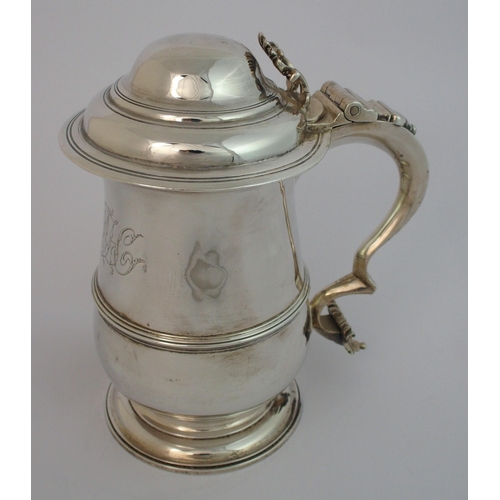 191 - A George III silver lidded tankard