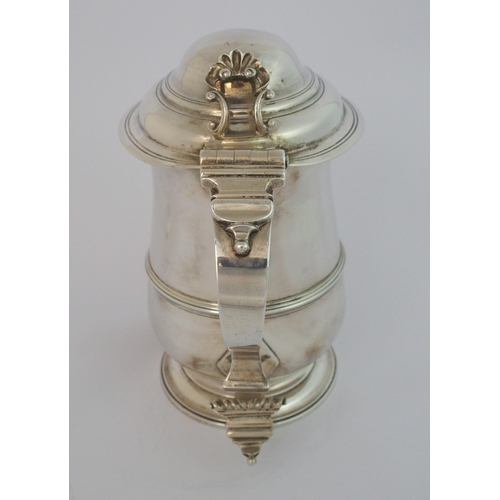 191 - A George III silver lidded tankard