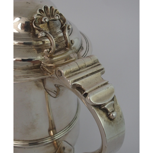 191 - A George III silver lidded tankard