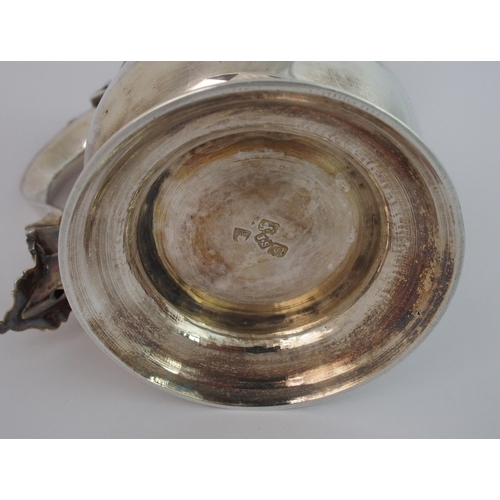 191 - A George III silver lidded tankard