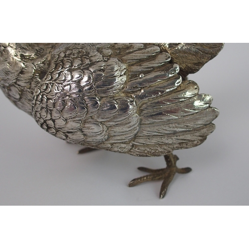 194 - A silver figure of a cock pheasant