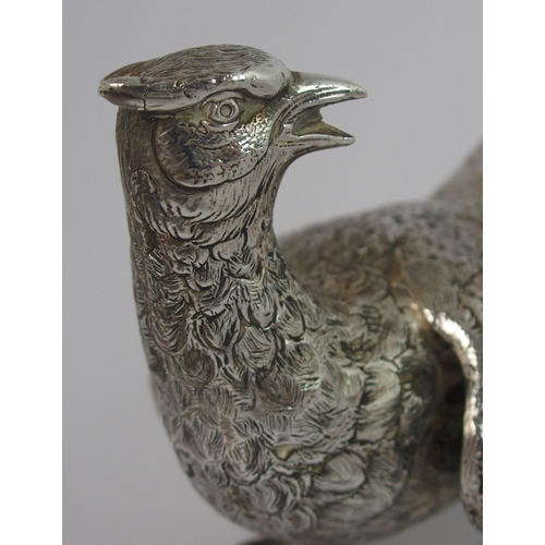 194 - A silver figure of a cock pheasant