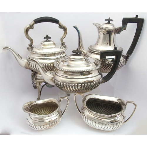 196 - A matched five piece silver tea service