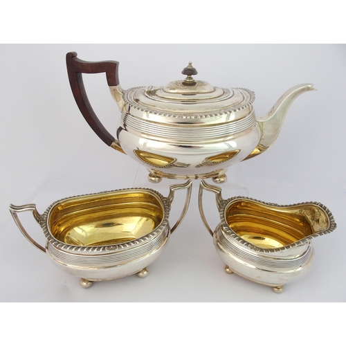 197 - A three piece silver tea service