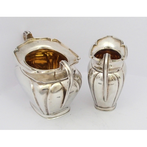 200 - A four piece silver tea service