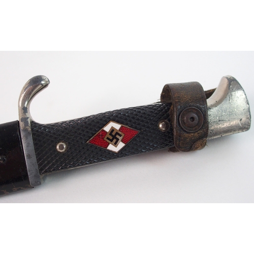 270 - A Second World War Hitler Youth dagger in black metal scabbard