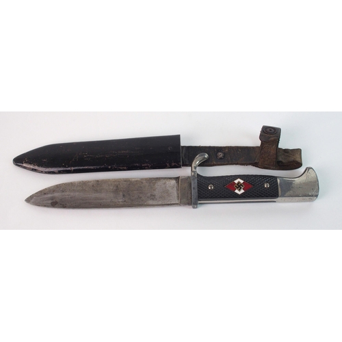 270 - A Second World War Hitler Youth dagger in black metal scabbard