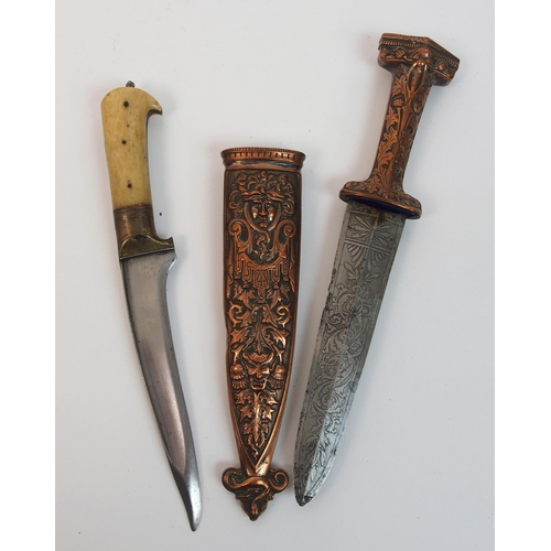 275 - An Eastern dagger with gilt metal hilt