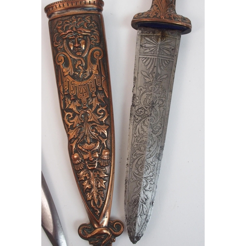 275 - An Eastern dagger with gilt metal hilt