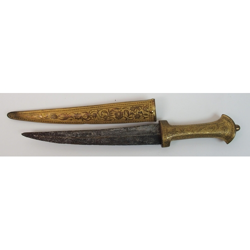 275 - An Eastern dagger with gilt metal hilt