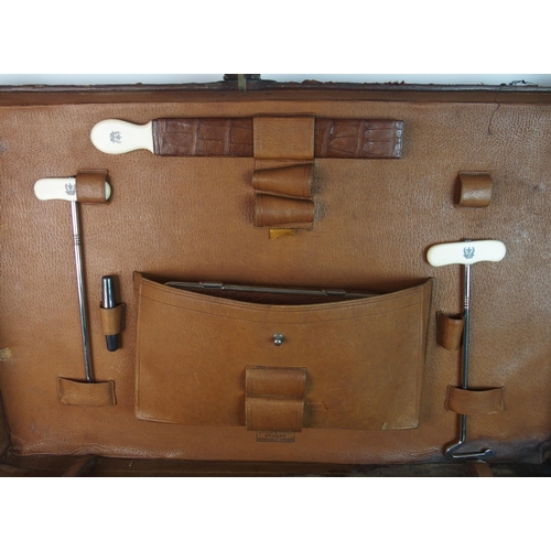 296 - A Victorian crocodile fitted gentleman's suitcase