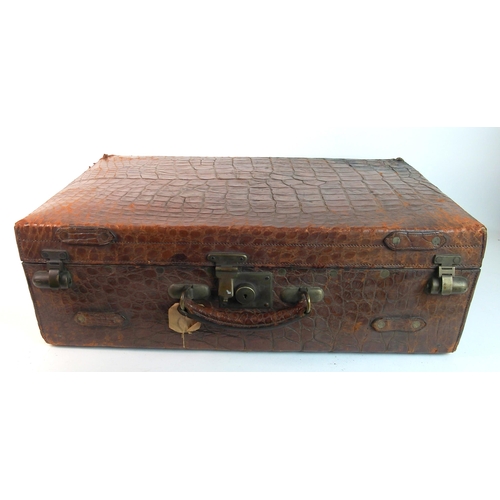 296 - A Victorian crocodile fitted gentleman's suitcase