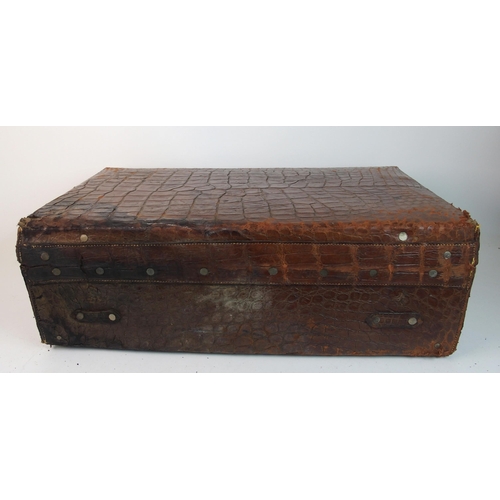 296 - A Victorian crocodile fitted gentleman's suitcase