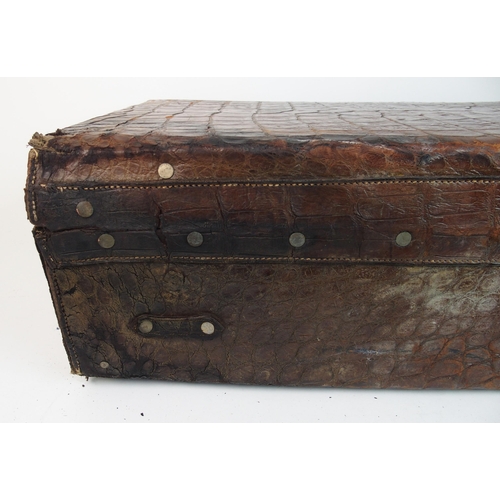 296 - A Victorian crocodile fitted gentleman's suitcase