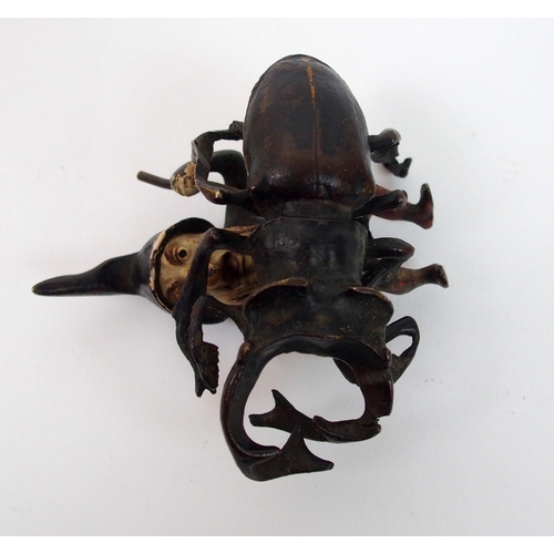 308 - A late 19th century Austrian cold painted bronze figure of a gnome and beetle