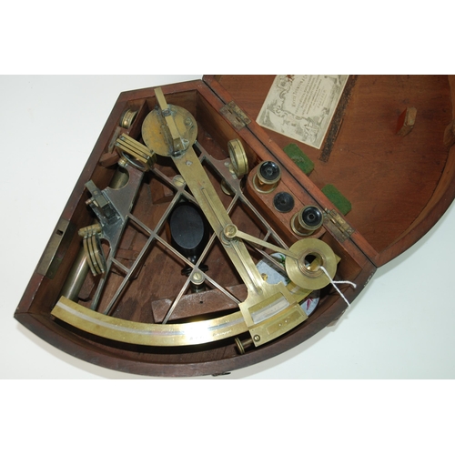 319 - A cased W C Cox brass sextant