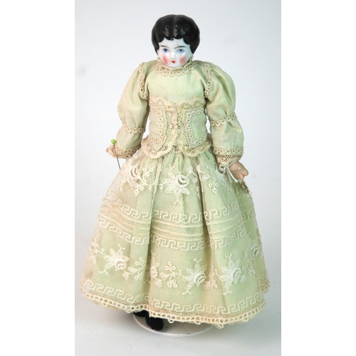 351 - A Parisian shoulder head doll