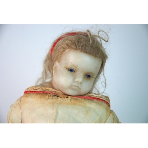 352 - A circa 1880s poured wax doll