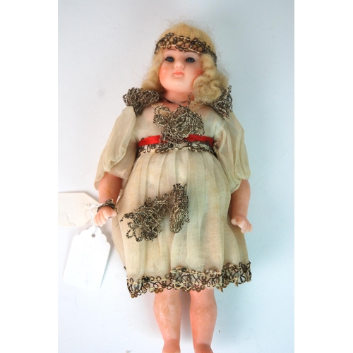 352 - A circa 1880s poured wax doll