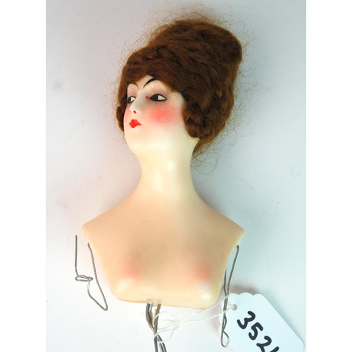 352 - A circa 1880s poured wax doll