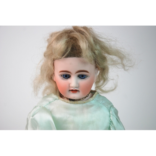 355 - A German bisque-headed doll