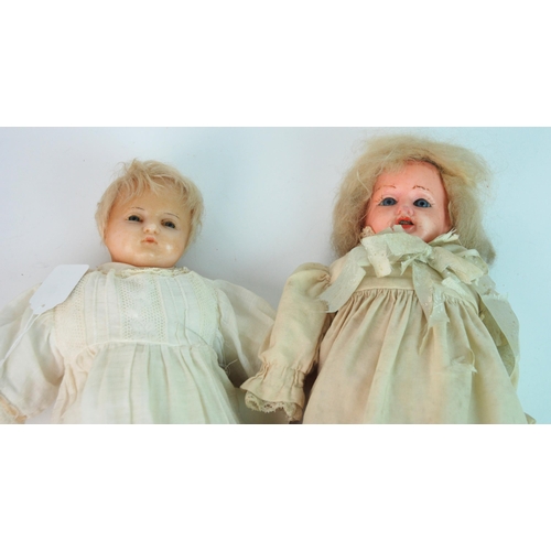 358 - A large wax-headed doll