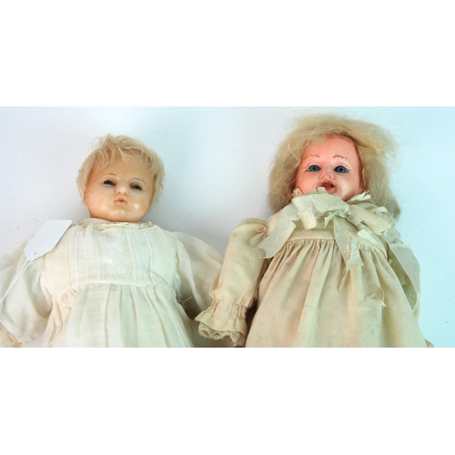 358 - A large wax-headed doll