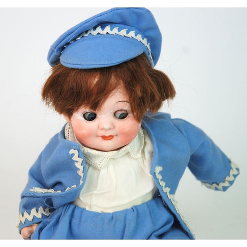 363 - A Marmouri Brothers bisque-headed doll