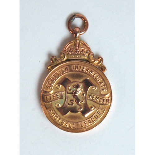 394 - A 9ct gold Scottish International Football League Medal