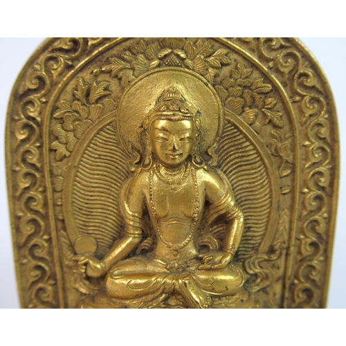 63 - A Chinese gilt bronze plaque of Buddha