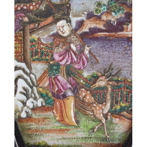 64 - A Cantonese famille rose shield shaped panel