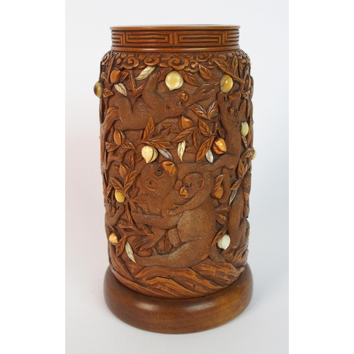 71 - A Japanese carved wood spill vase